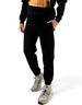 Uomo indossa pantaloni felpa neri Ko Samui in misto cotone con vestibilità regular fit e polsini elasticizzati