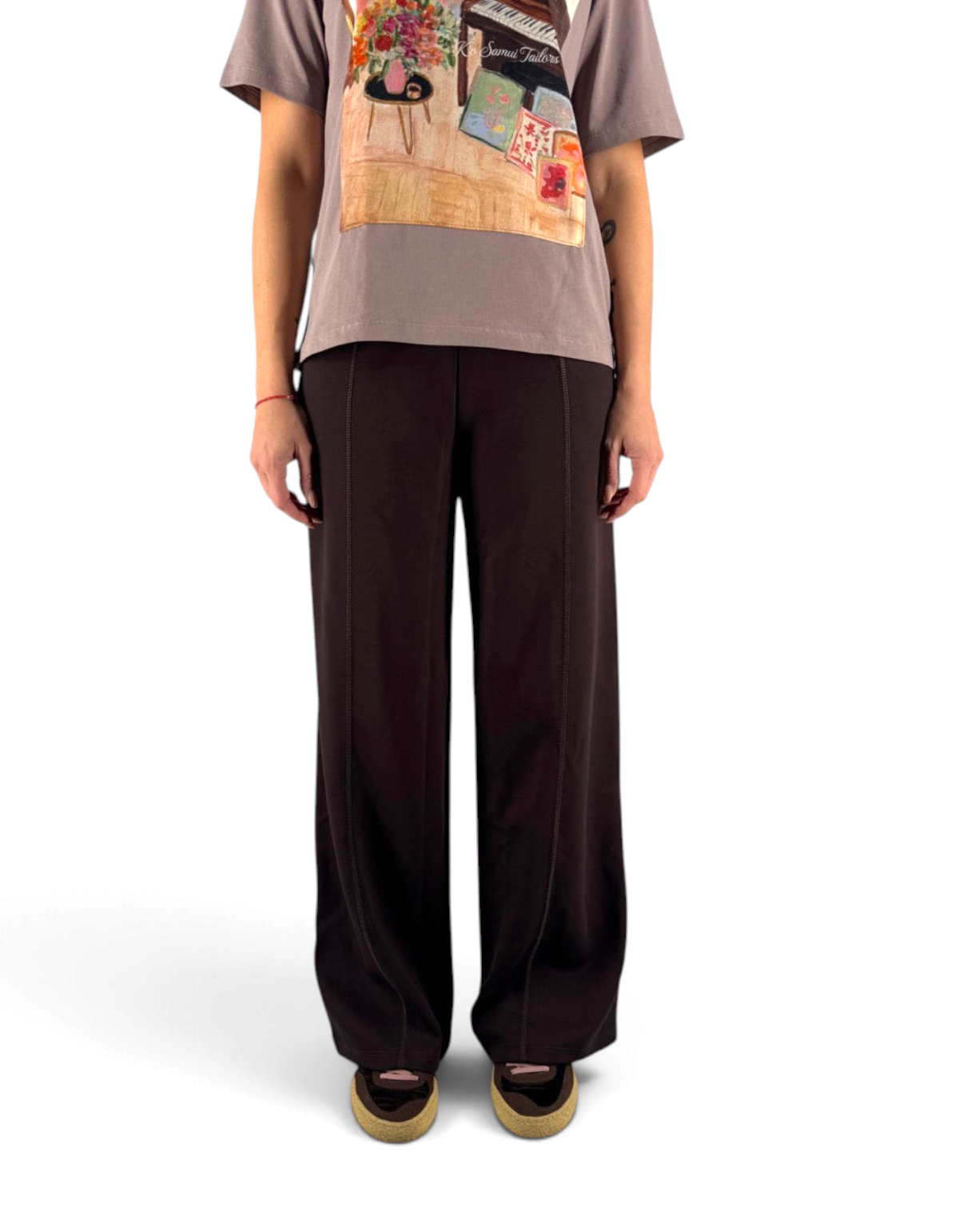 Pantaloni loose fit marroni in misto viscosa Ko Samui, dal taglio rilassato e design essenziale Made in Italy.